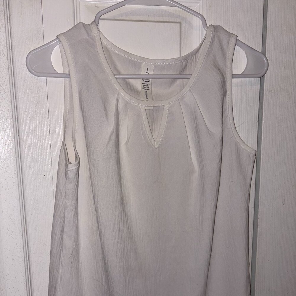 White Sleeveless Blouse